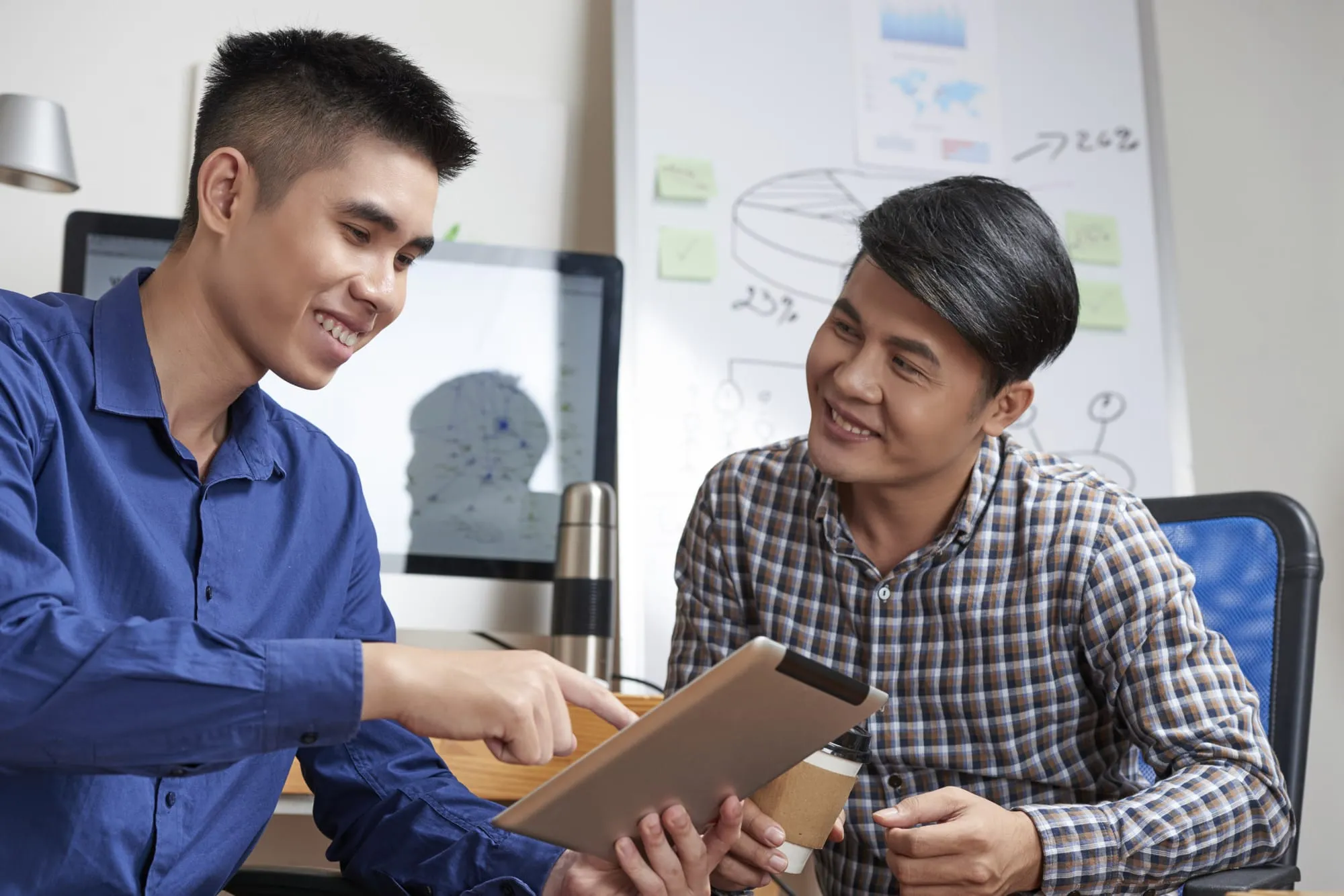 Startuppers With Digital Tablet